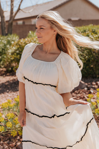 THE IRELYN RUFFLED MAXI DRESS IN IVORY