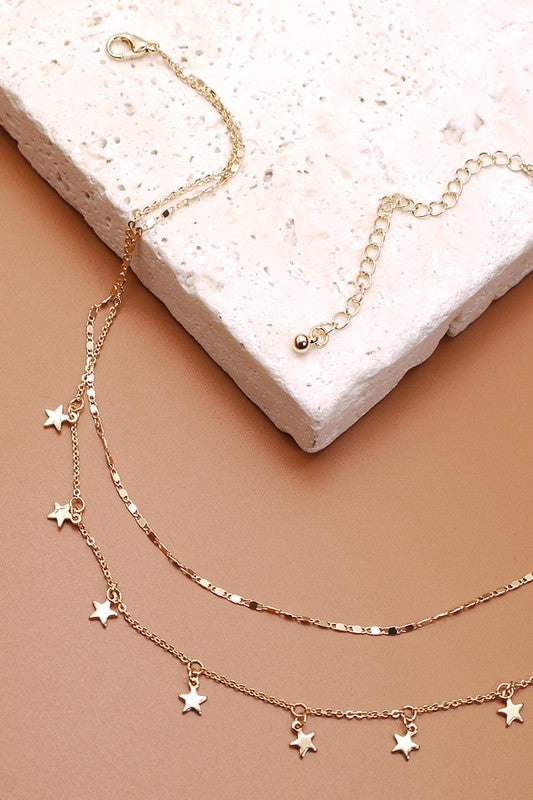 THE DAINTY DOUBLE LAYER STAR NECKLACE IN GOLD