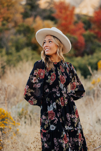 THE LAICEE SMOCKED FLORAL DRESS IN BLACK