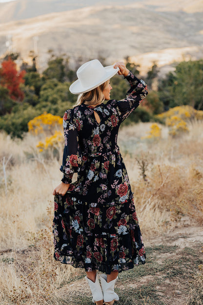 THE LAICEE SMOCKED FLORAL DRESS IN BLACK