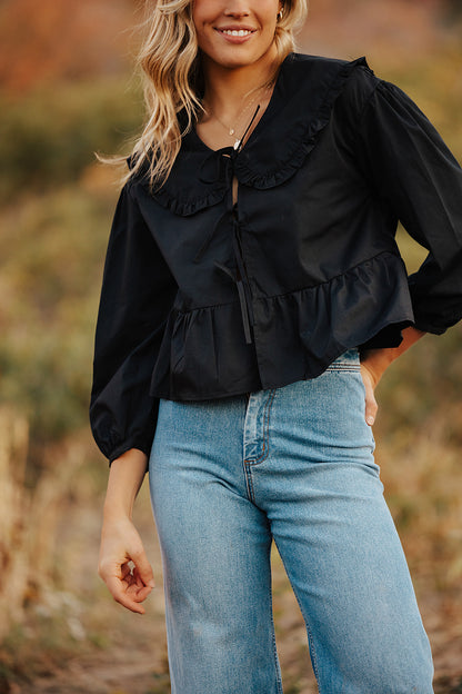 THE RYDELL RUFFLE BLOUSE IN BLACK