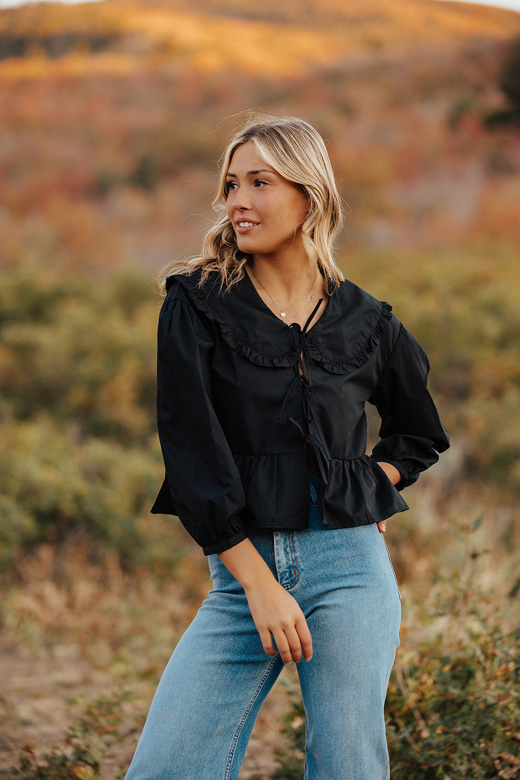 THE RYDELL RUFFLE BLOUSE IN BLACK