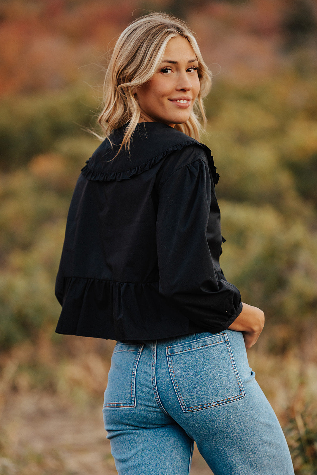 THE RYDELL RUFFLE BLOUSE IN BLACK