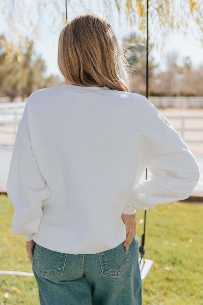 THE EMBROIDERED HOLIDAY BOW PULLOVER IN PINK