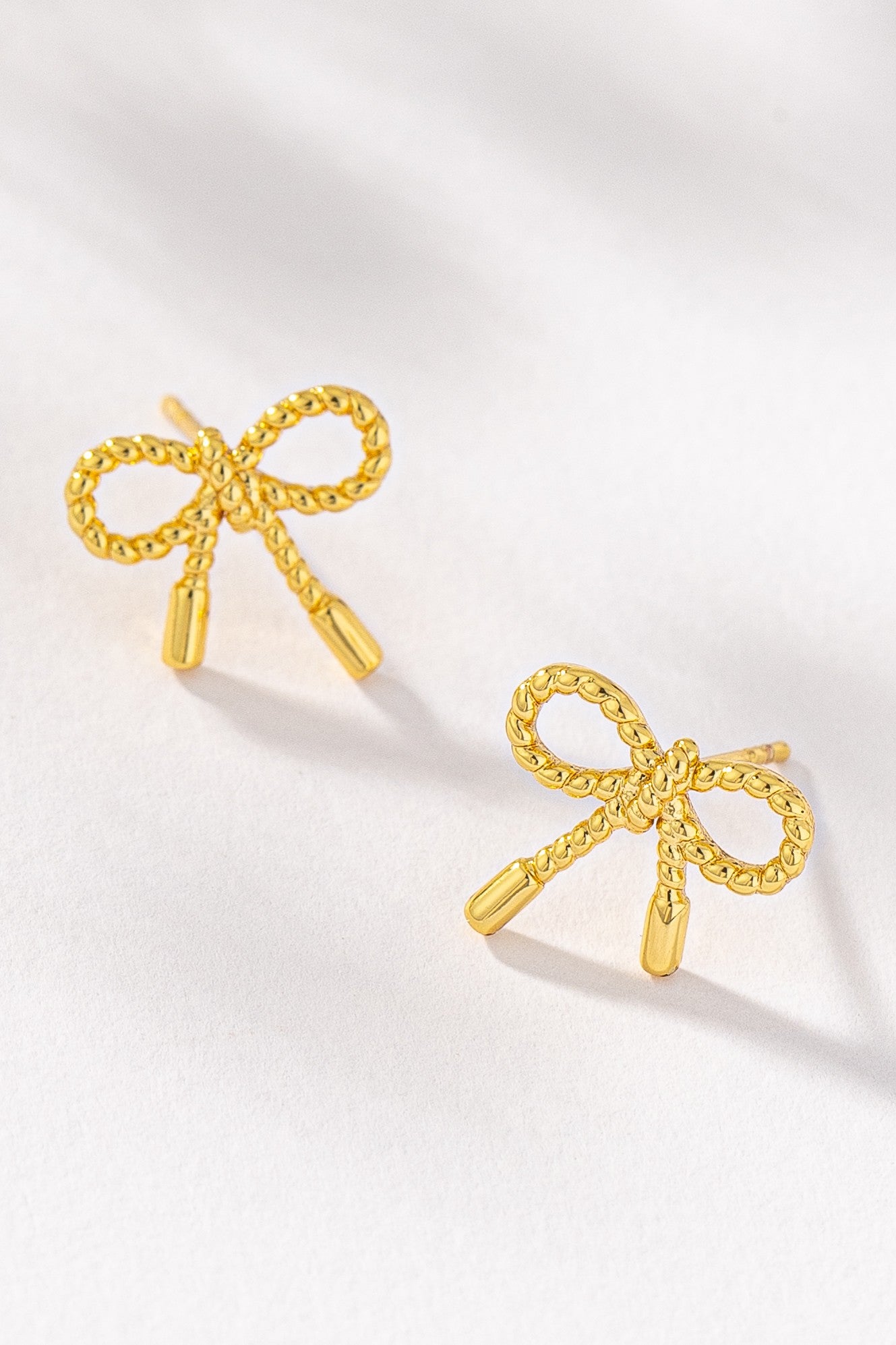 THE SMALL BOW STUD EARRINGS IN GOLD