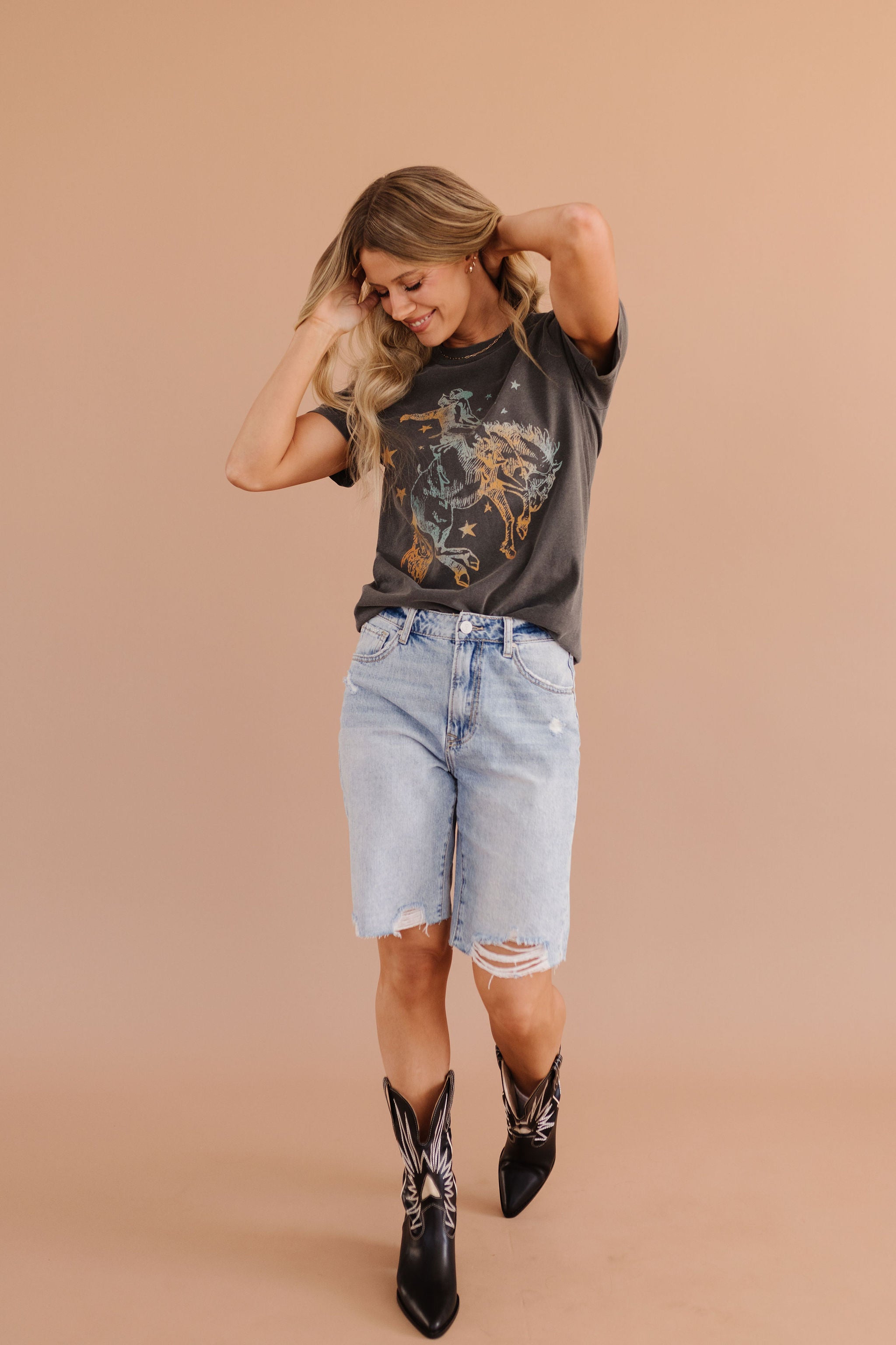 THE LILO HIGH RISE DISTRESSED BERMUDA SHORTS IN MEDIUM WASH