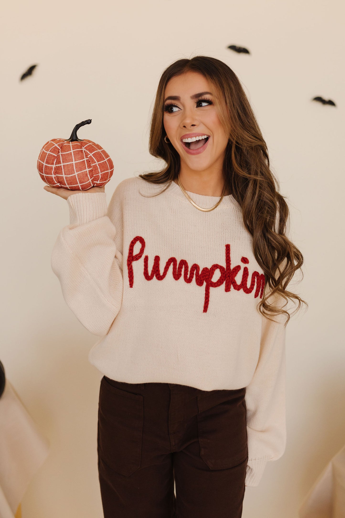 THE PUMPKIN EMBROIDERED KNIT SWEATER IN CREAM