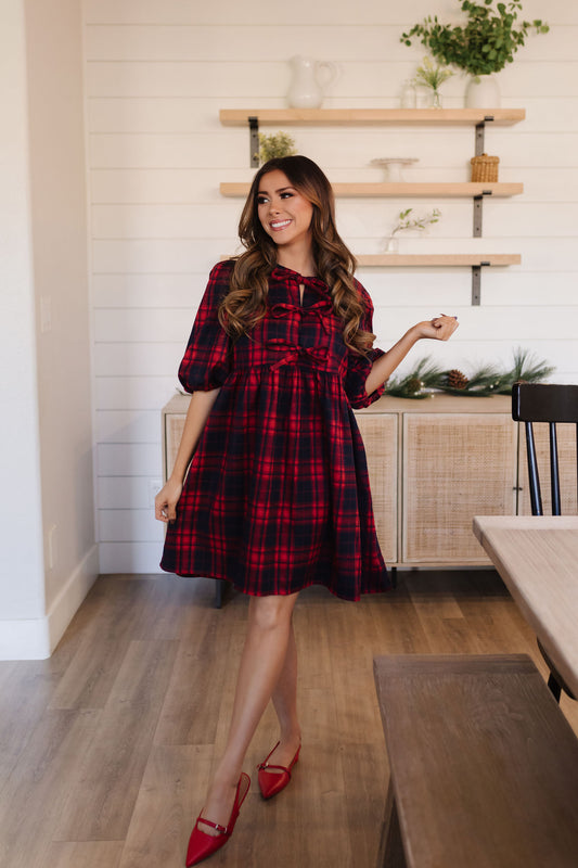 THE TRISTANN PLAID RIBBON TIE FRONT MINI DRESS IN RED