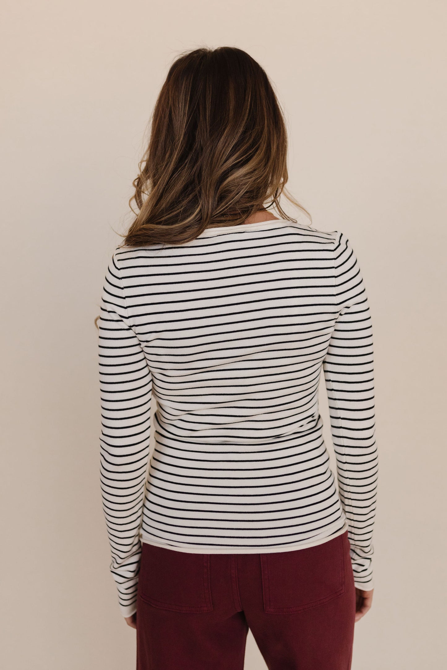 THE ROSLYNN LONG SLEEVE KNIT TOP IN BLACK STRIPE