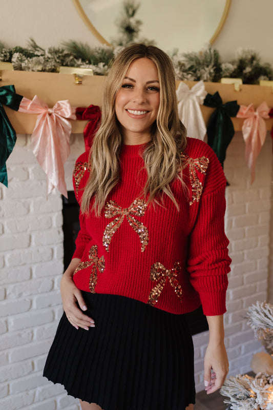 THE RAYLAN RIBBON HOLIDAY SWEATER IN RED