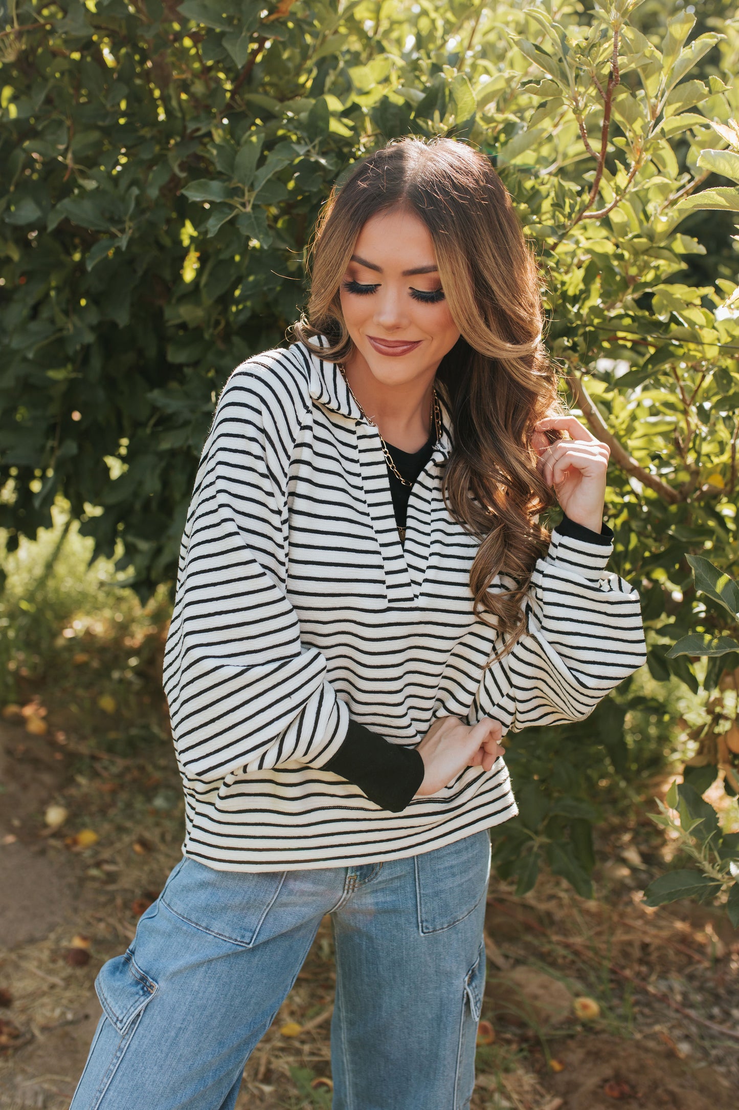 THE CORIE STRIPED PULLOVER IN CREAM