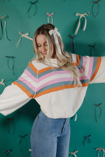 THE MAGDALINE STRIPED UNIVERSITY LONG SLEEVE IN CREAM