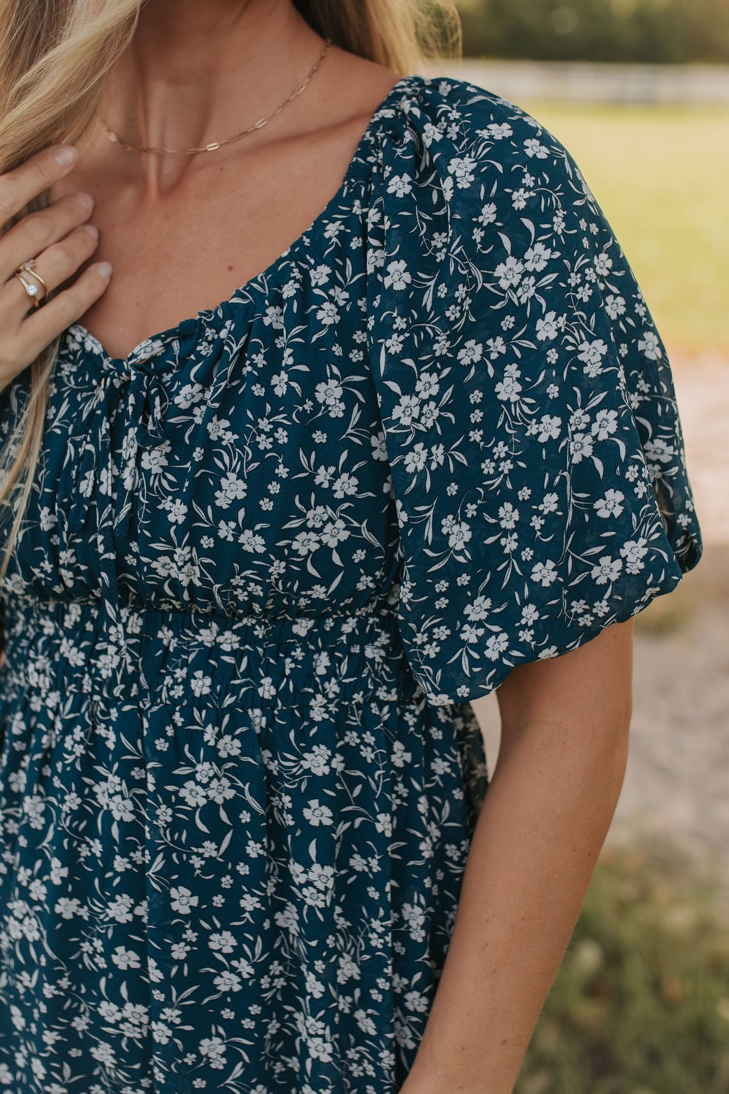 THE DELICIA FLORAL DRESS IN TEAL