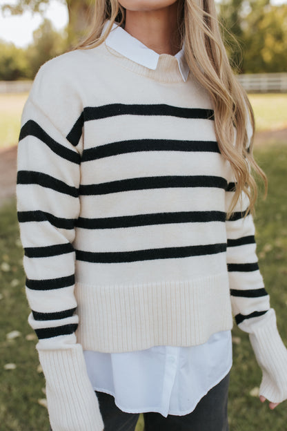 THE JESSI STRIPED MOCK NECK SWEATER IN CREAM