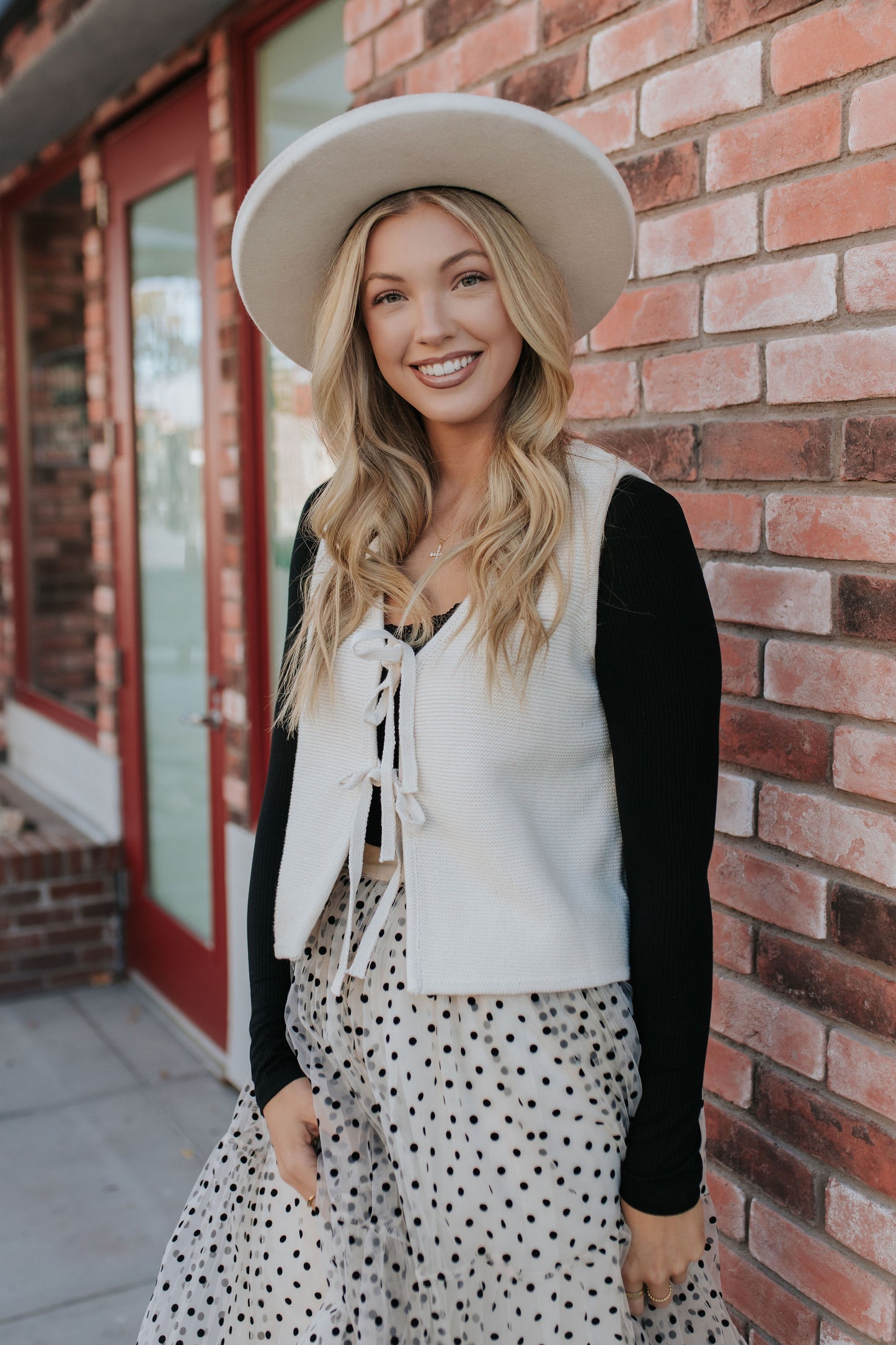 THE KENNY TIE FRONT KNIT VEST IN CREAM