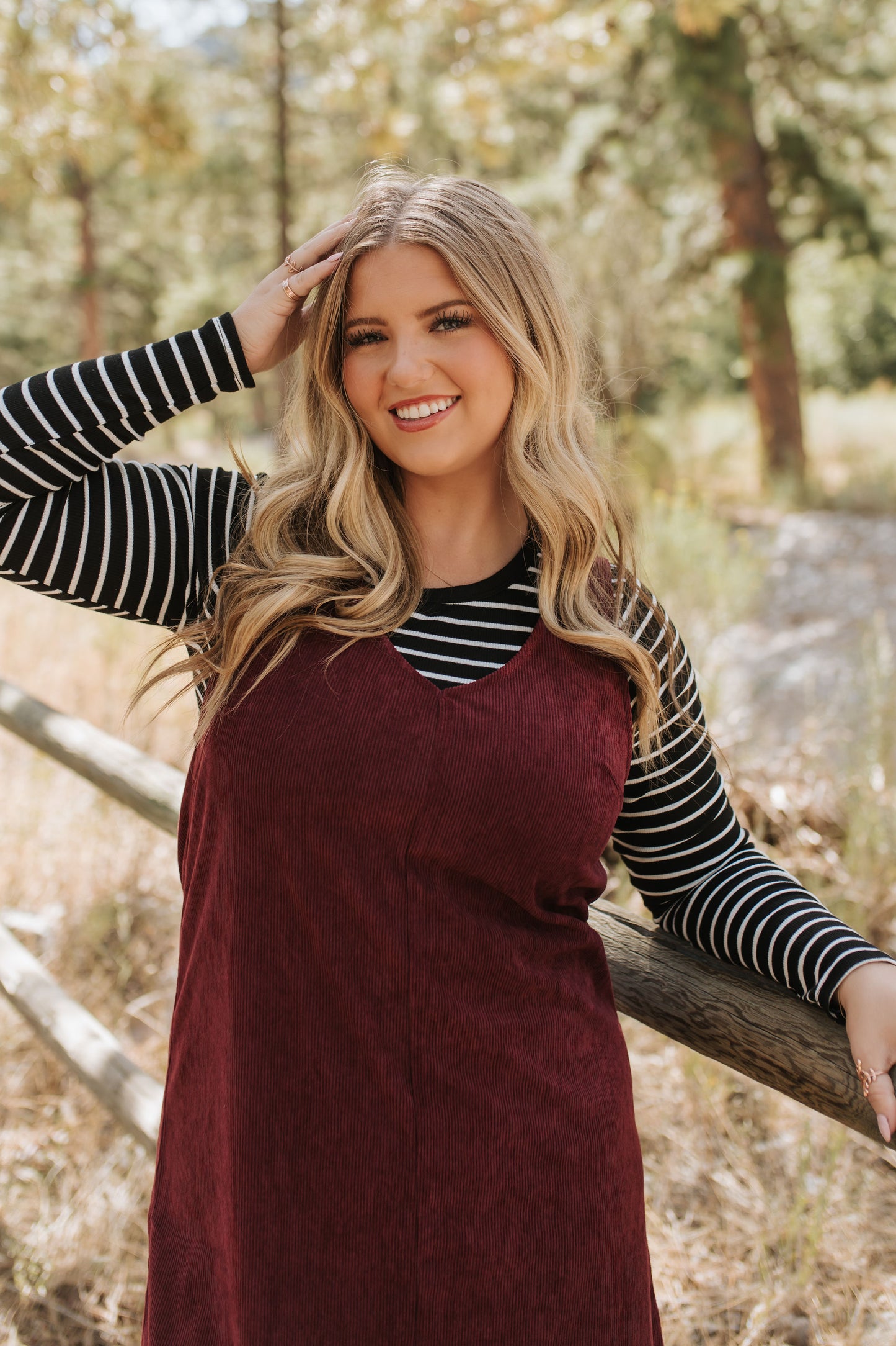 THE BLAKE OVERALL DRESS IN BURGUNDY CORDUROY BY PINK DESERT