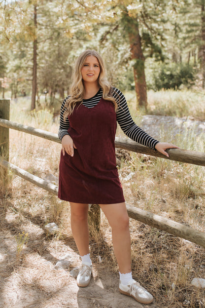 THE BLAKE OVERALL DRESS IN BURGUNDY CORDUROY BY PINK DESERT