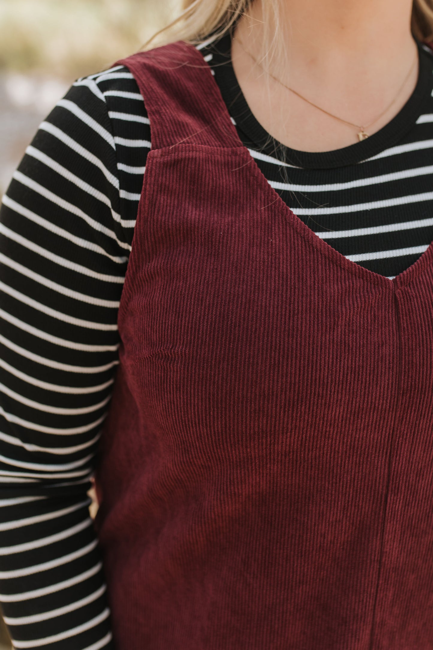 THE BLAKE OVERALL DRESS IN BURGUNDY CORDUROY BY PINK DESERT