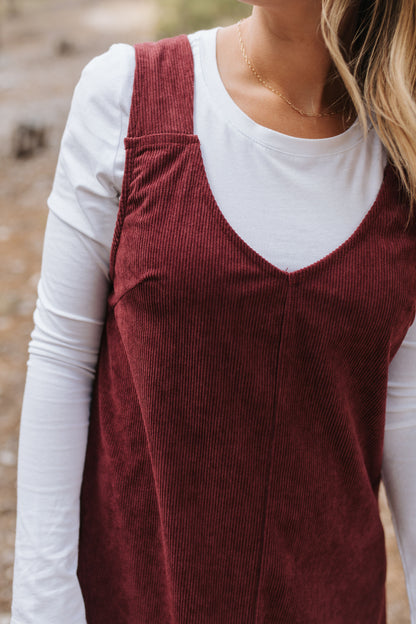 THE BLAKE OVERALL DRESS IN BURGUNDY CORDUROY BY PINK DESERT