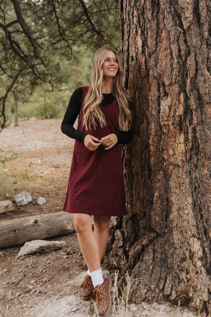 THE BLAKE OVERALL DRESS IN BURGUNDY CORDUROY BY PINK DESERT