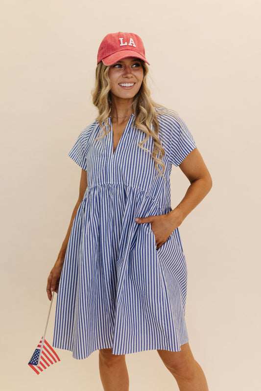 THE ABBY STRIPED BABYDOLL DRESS IN BLUE