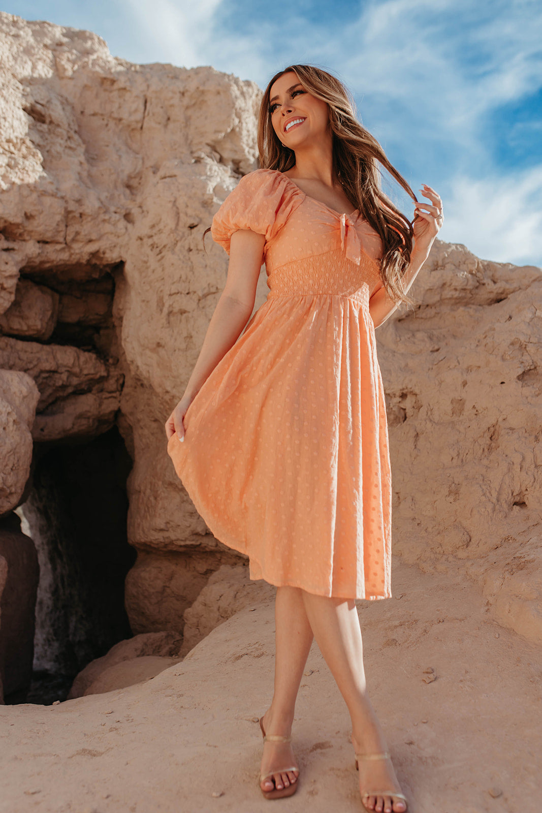 THE PAISLEY TIE FRONT SWISS DAISY DRESS IN PEACHY PEACH BY PINK DESERT