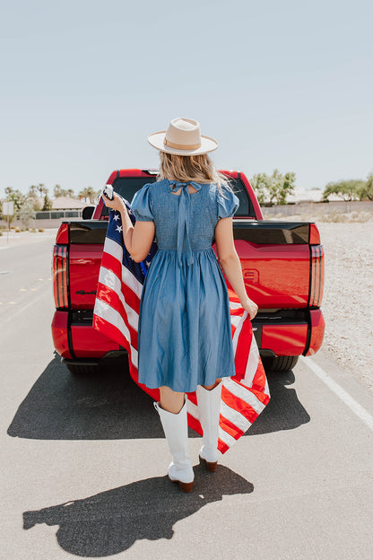 THE KENNEDY SMOCKED DRESS IN CHAMBRAY BY PINK DESERT