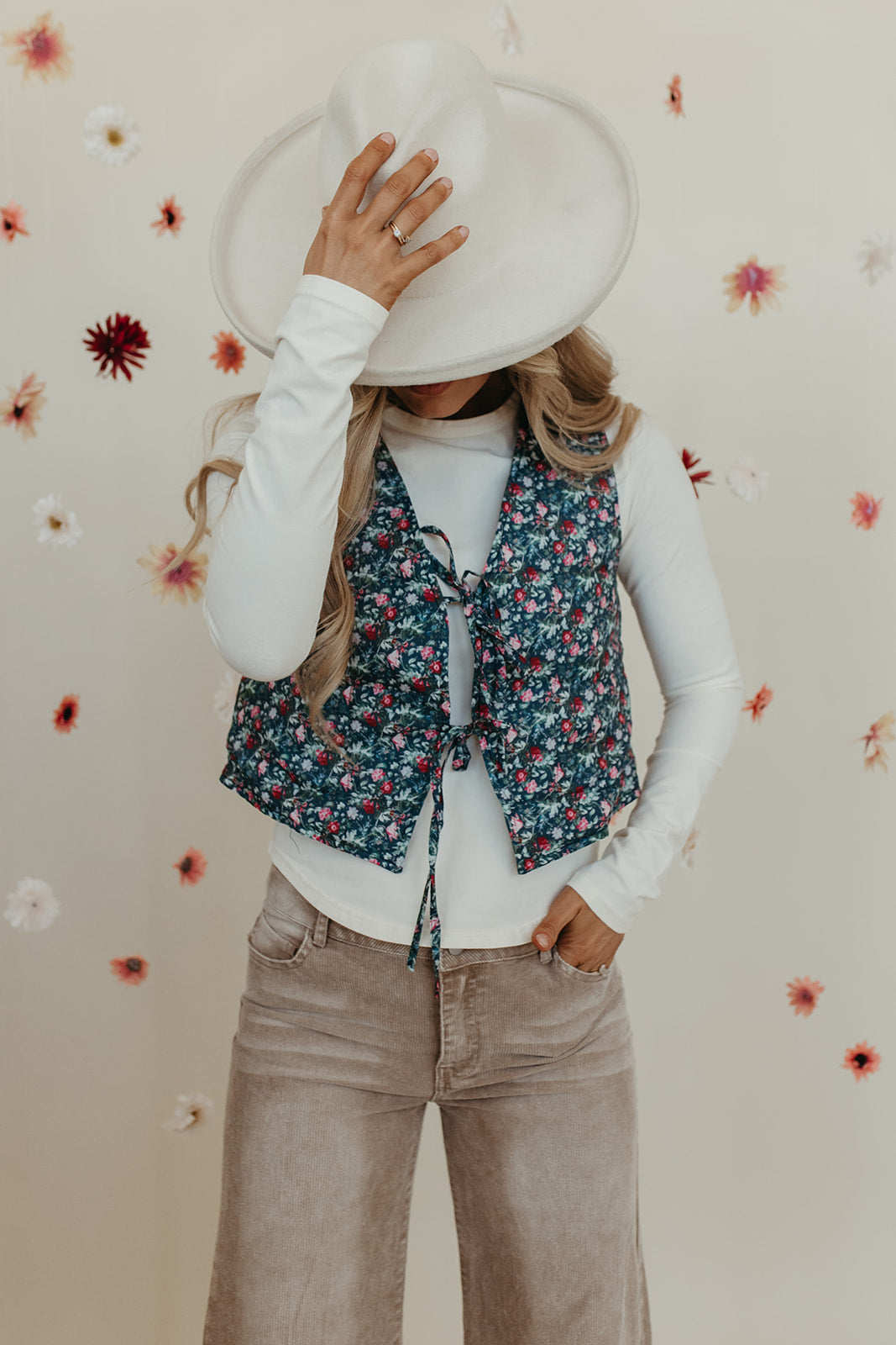 THE VAIDA TIE FRONT VEST IN BLUE FLORAL