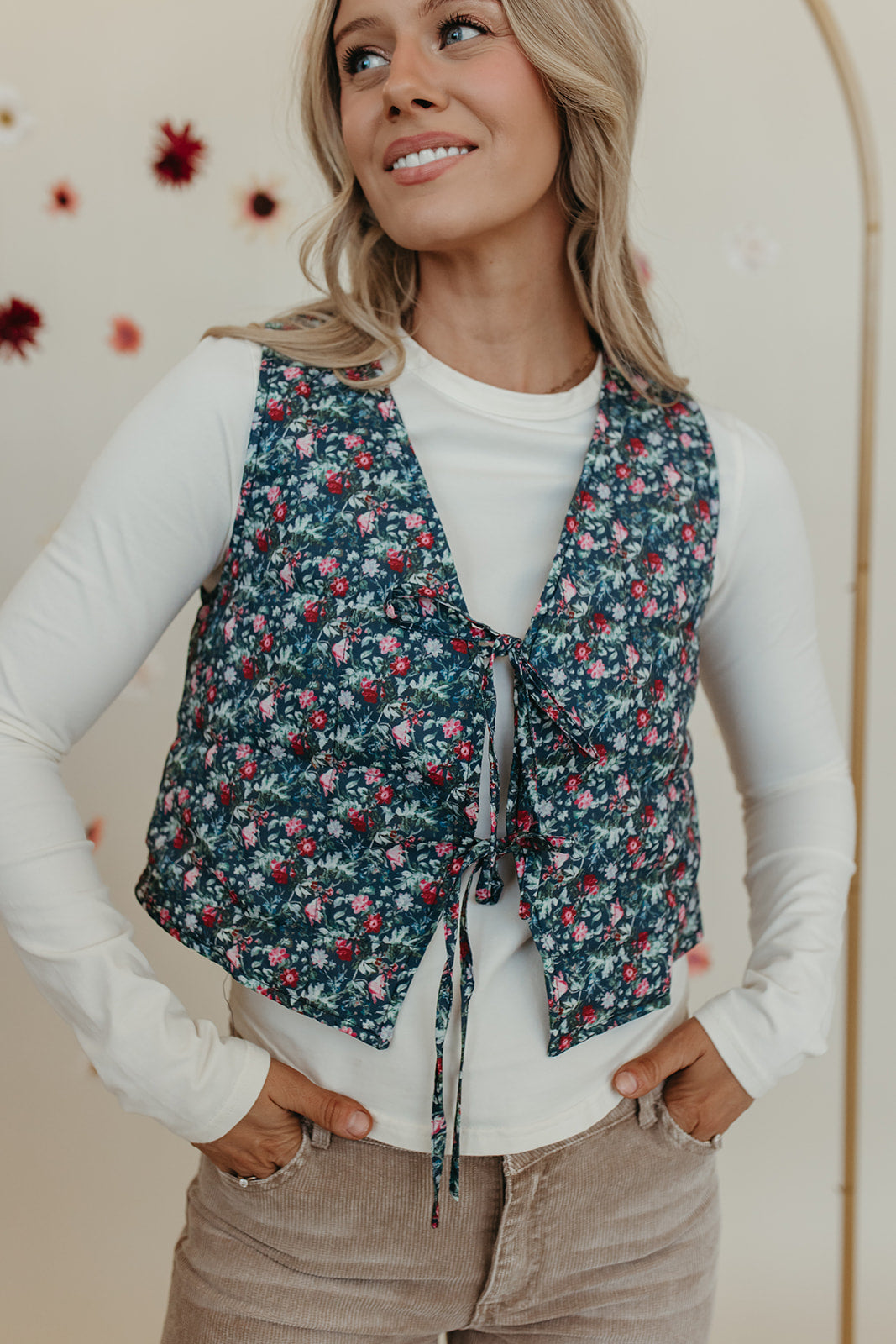 THE VAIDA TIE FRONT VEST IN BLUE FLORAL