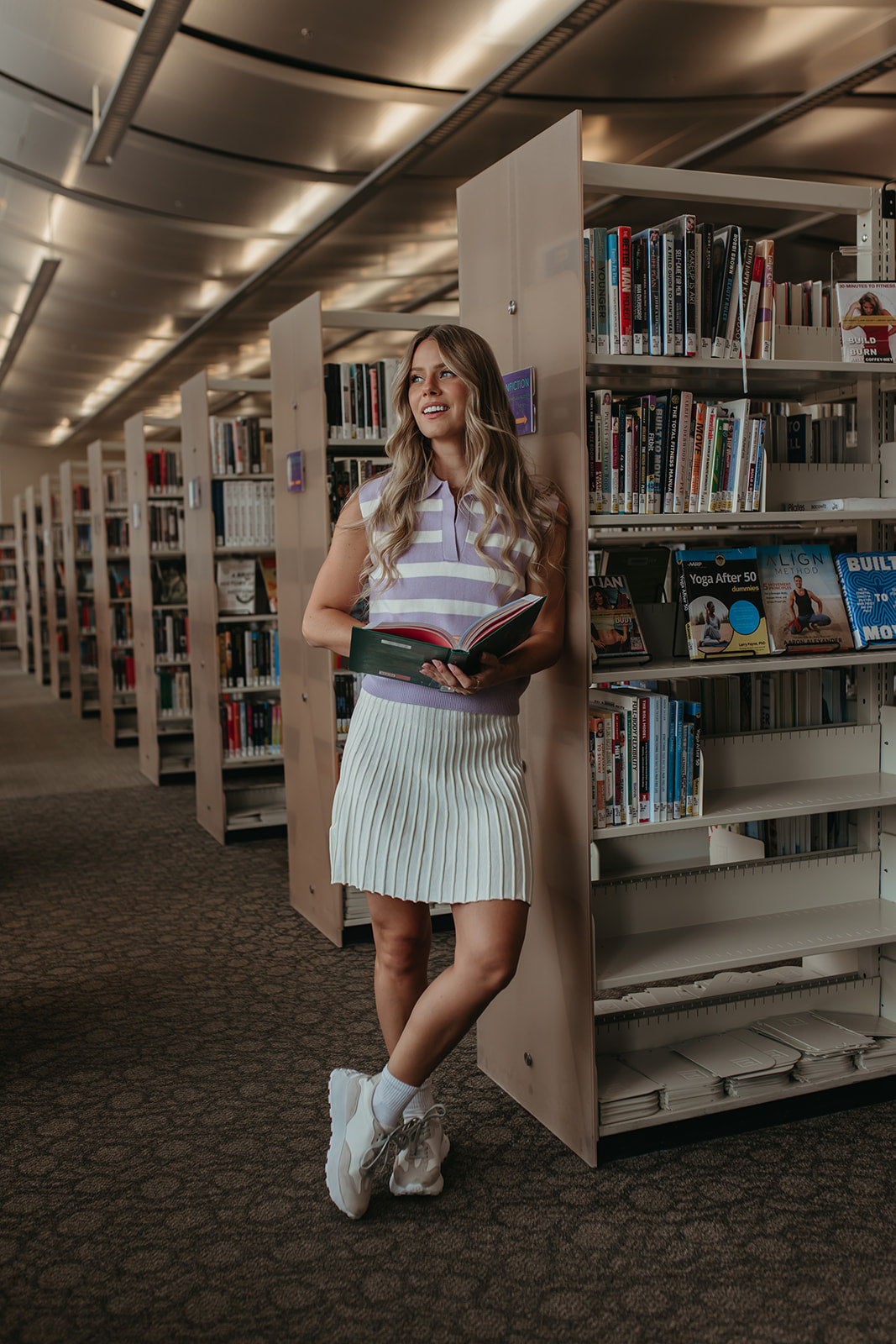 THE LORALI PLEATED MINI SKIRT IN CREAM