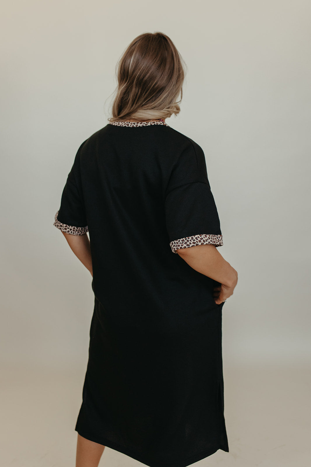 THE BRIDGET ANIMAL PRINT MIDI DRESS IN BLACK