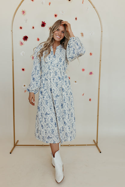 THE JANIE PRINTED V-NECK LONG SLEEVE MAXI DRESS IN CREAM