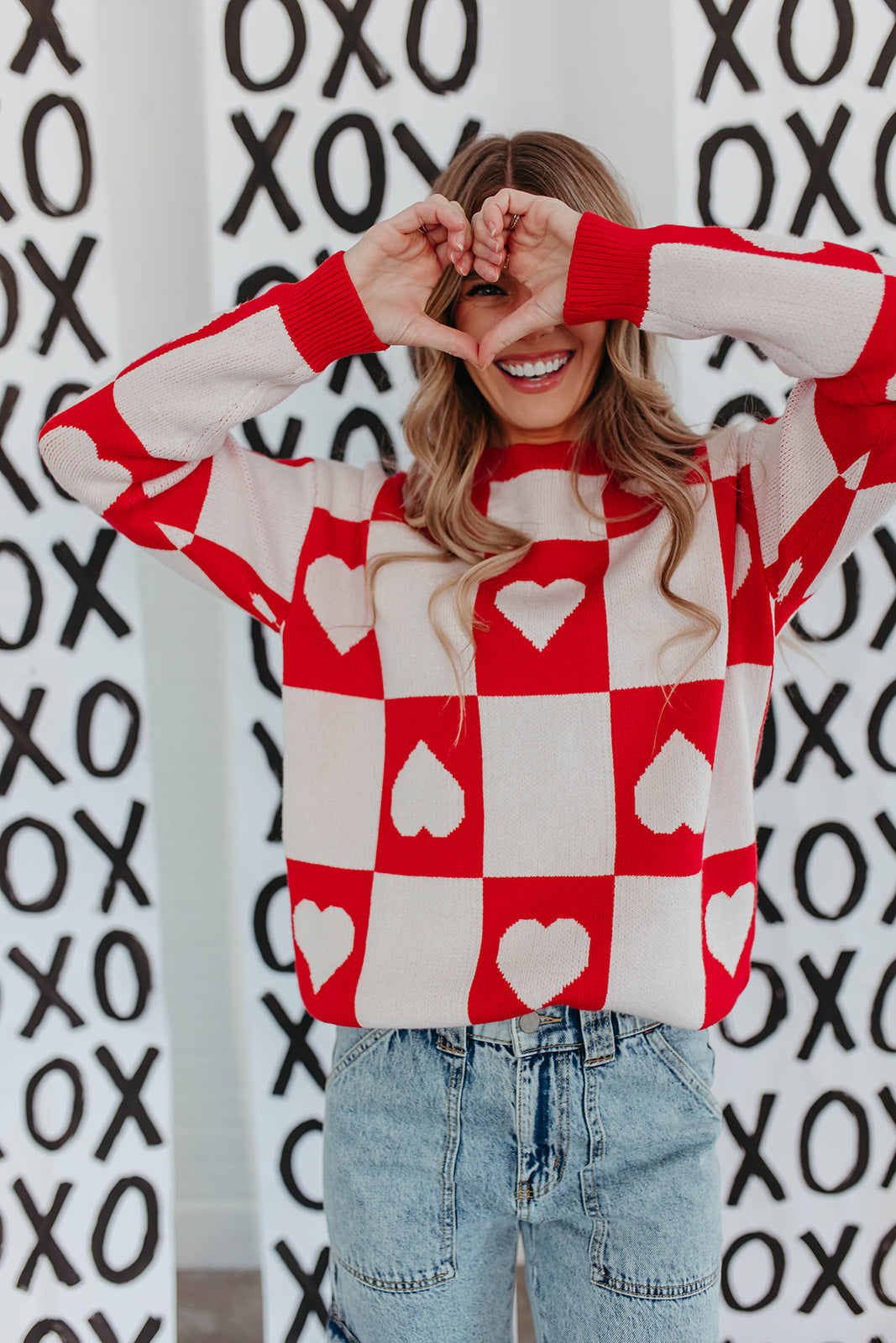 THE RAMONA CHECKERED HEART SWEATER IN RED