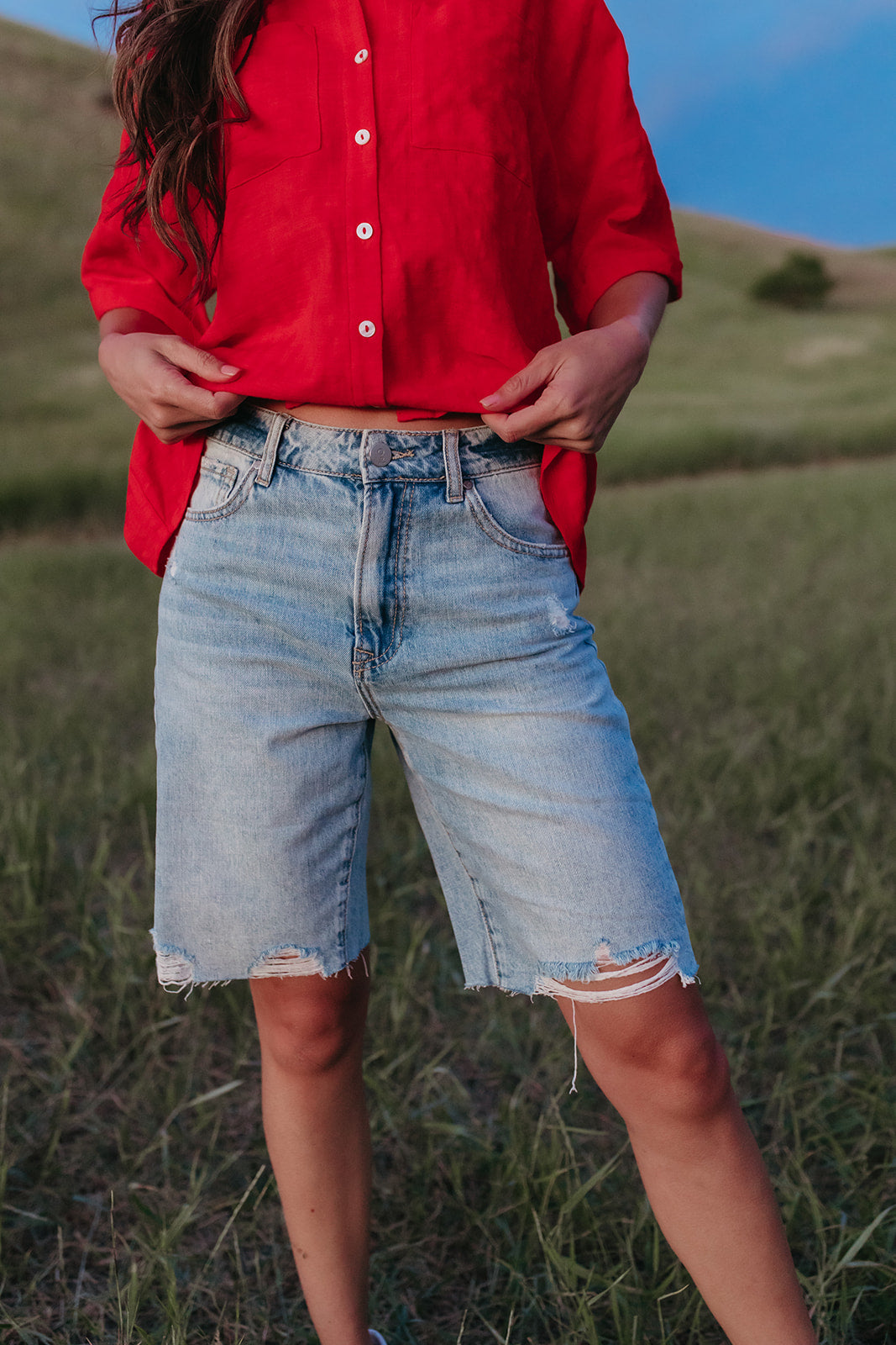 Bermuda distressed jean shorts online