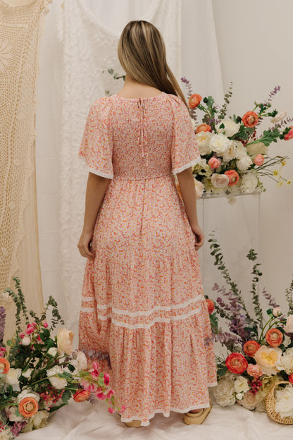 THE DANA SMOCKED MAXI DRESS IN CORAL