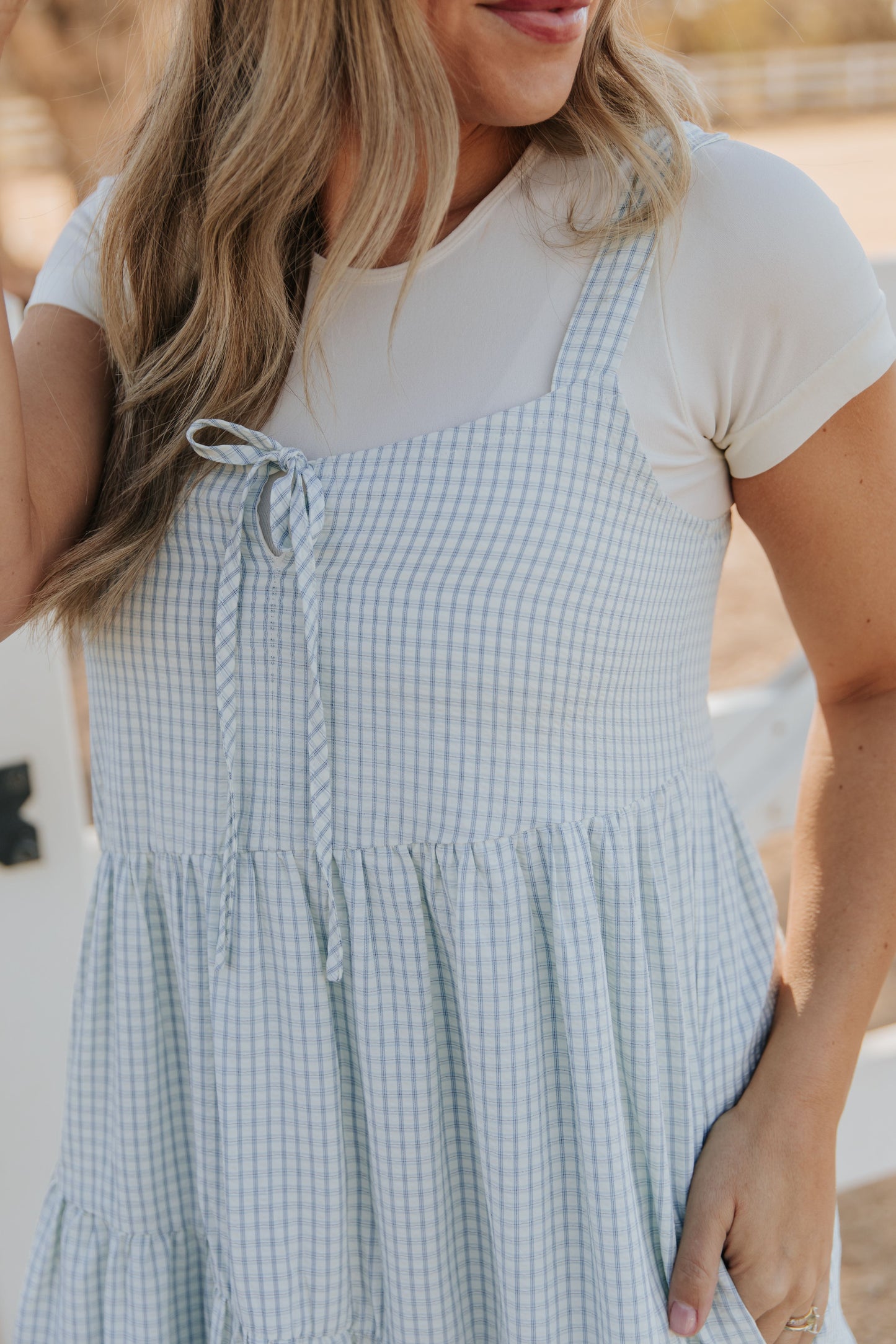 THE ALORA ASYMMETRICAL MIDI DRESS IN BLUE PLAID