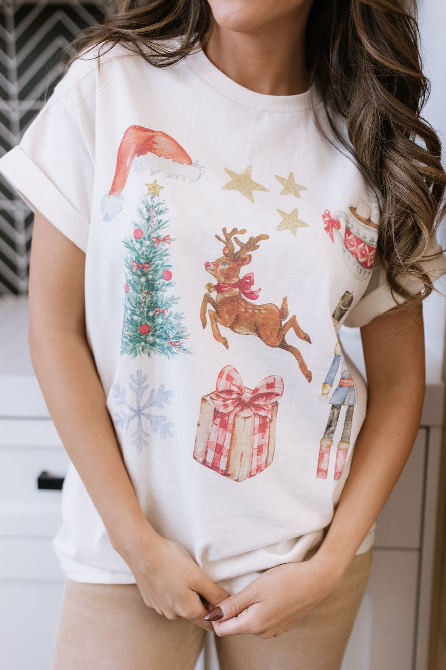 THE CHRISTMAS COLLAGE GRAPHIC TEE IN IVORY