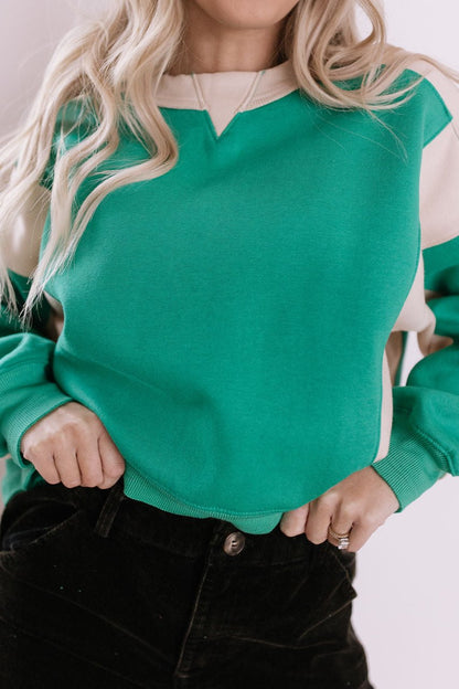 THE GIULIANA CONTRAST PULLOVER WITH ASYMMETRICAL HEMLINE IN GREEN