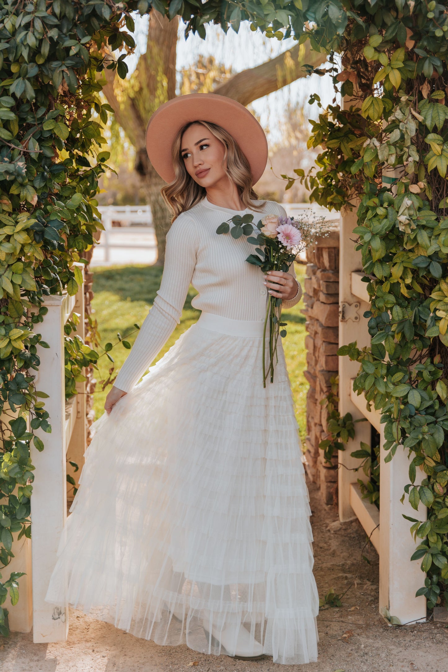 THE CASCADE TULLE TIERED MIDI SKIRT IN CREAM