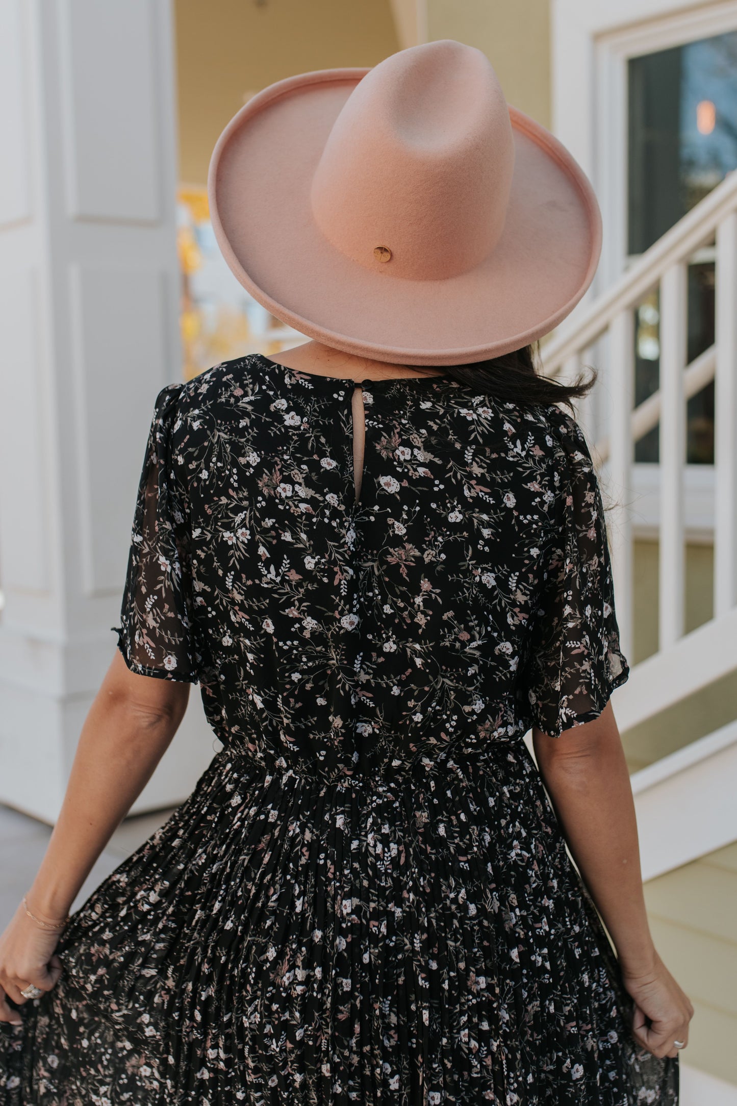 THE MEADOW PLEATED FLORAL MIDI DRESS IN BLACK