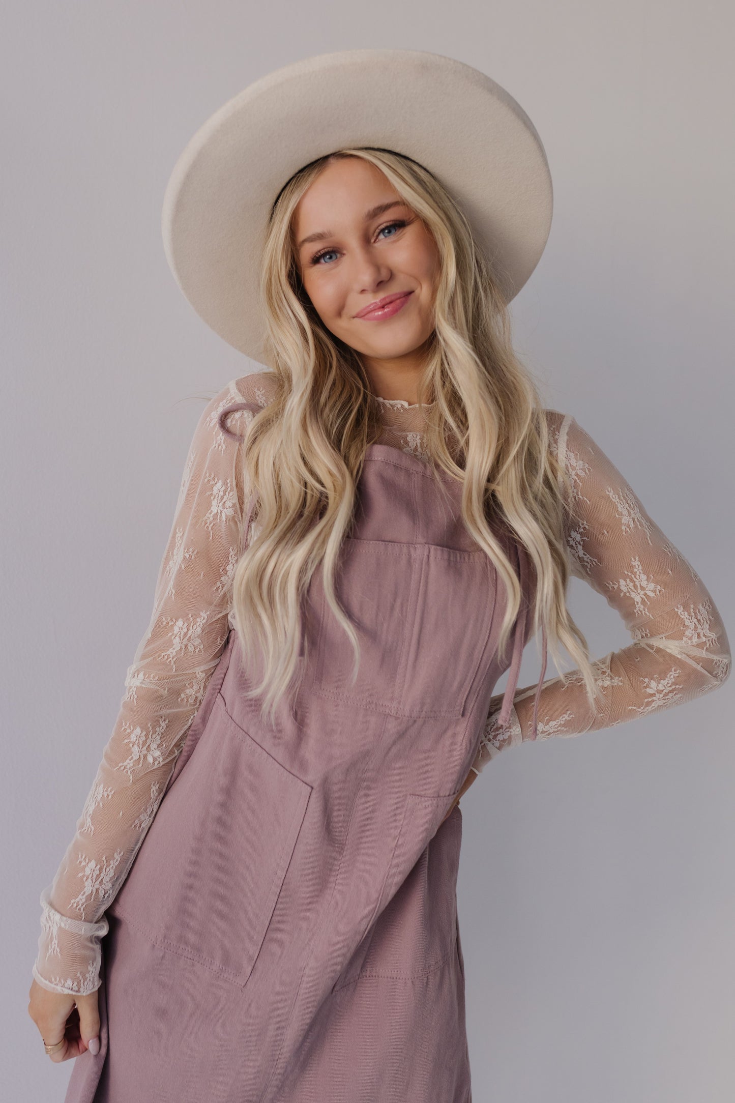 THE SAIGE OVERALL DRESS IN DUSTY MAUVE