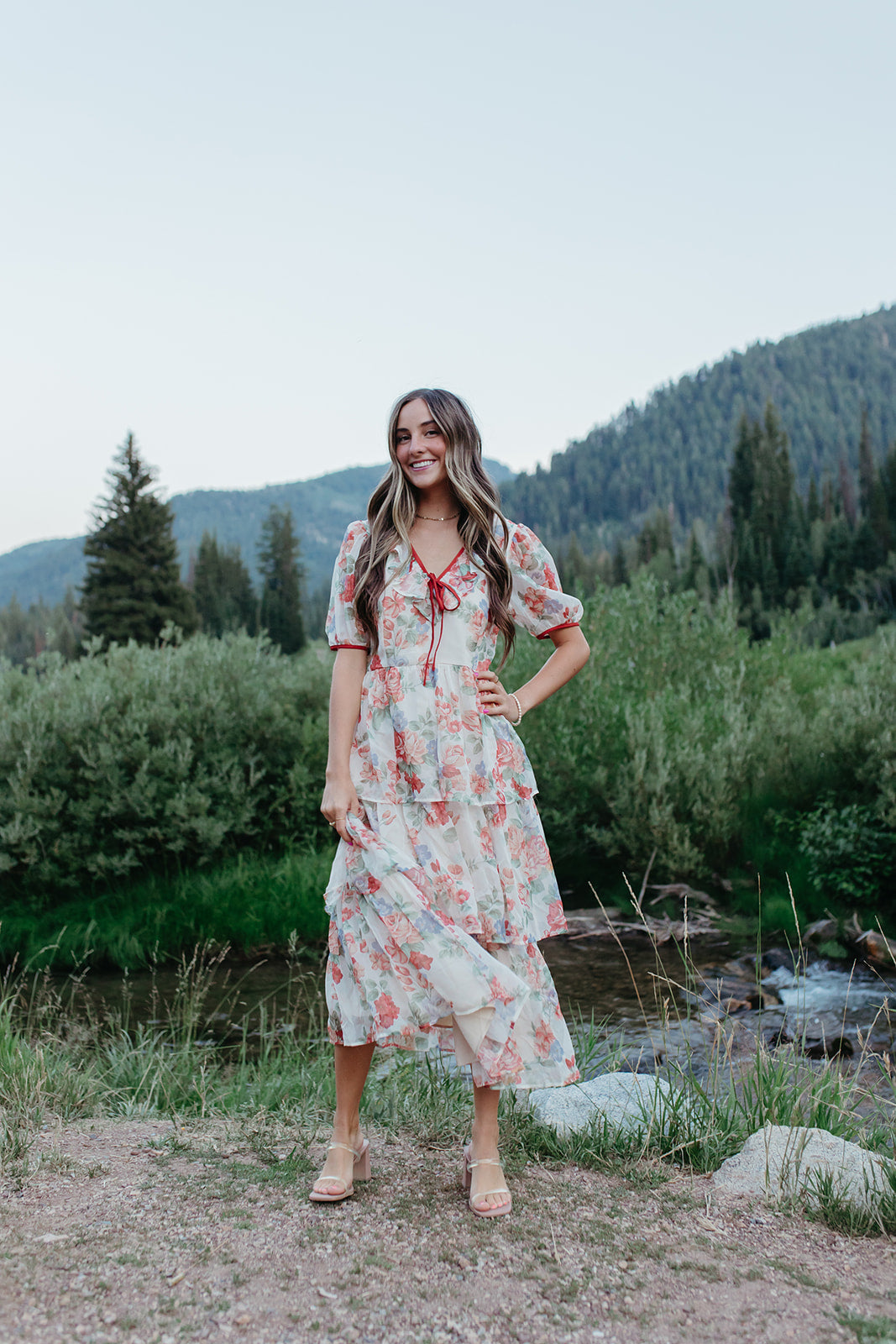 THE VICTORIA TIERED FLORAL DRESS IN RED TRIM