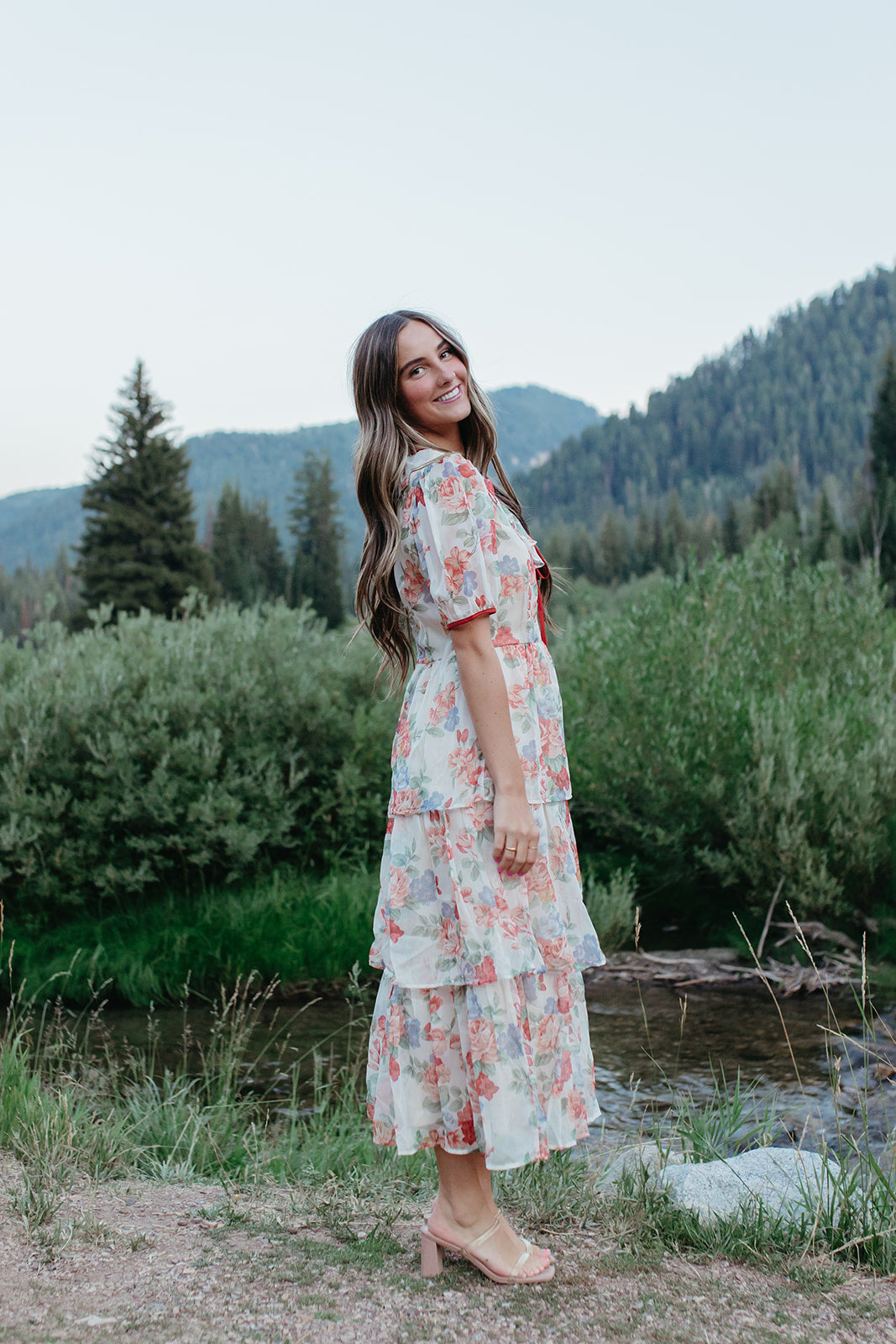 THE VICTORIA TIERED FLORAL DRESS IN RED TRIM