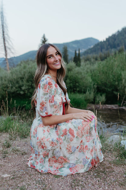 THE VICTORIA TIERED FLORAL DRESS IN RED TRIM