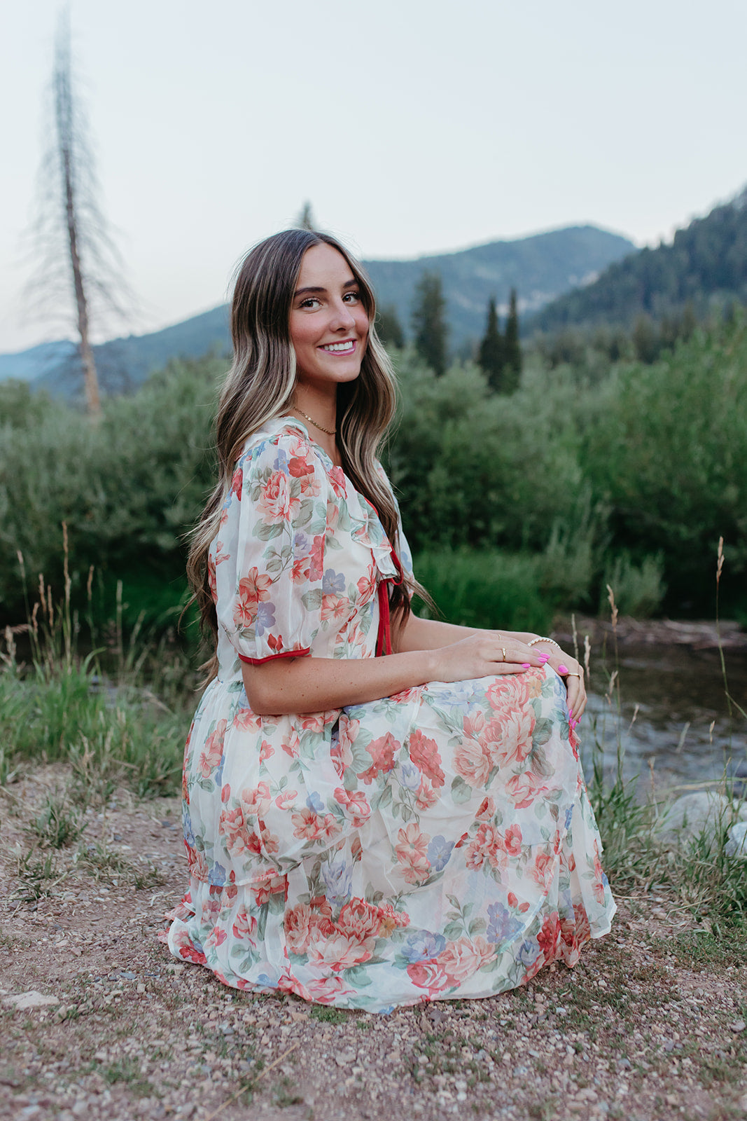 THE VICTORIA TIERED FLORAL DRESS IN RED TRIM