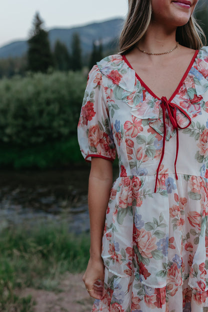 THE VICTORIA TIERED FLORAL DRESS IN RED TRIM