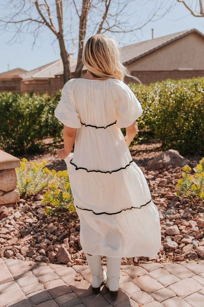 THE IRELYN RUFFLED MAXI DRESS IN IVORY