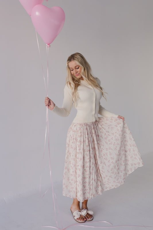 THE PATIENCE FLORAL PLEATED MIDI SKIRT IN PINK