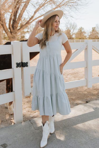 THE ALORA ASYMMETRICAL MIDI DRESS IN BLUE PLAID