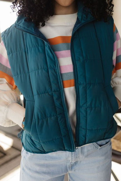 THE VERITY SOLID PUFFER VEST IN SEA FOAM